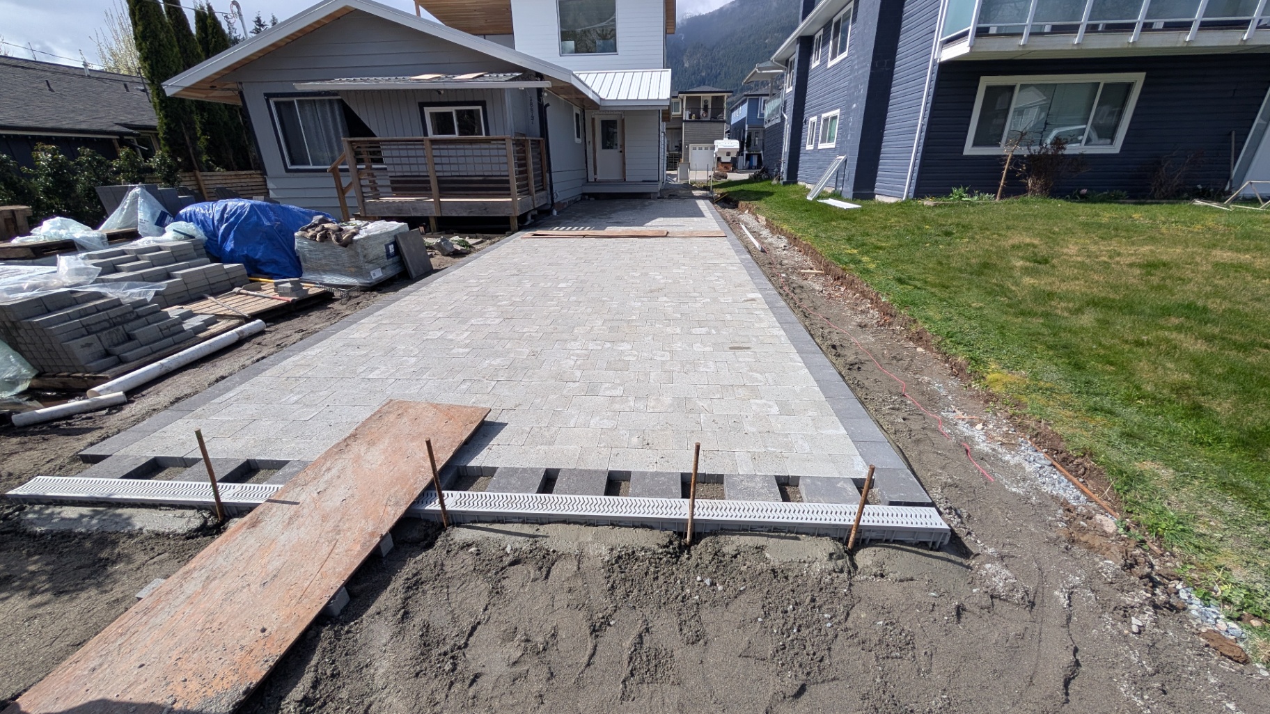 Paver driveway with integrated drainage on a residential property